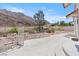 Backyard patio with gate access and mountain views at 672 Los Feliz St, Las Vegas, NV 89110