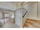 View of the staircase leading to the second floor, with a view into the living area at 6737 Boccelli Ct, Las Vegas, NV 89139