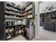 Well-organized pantry with custom shelving and storage at 6833 Desert Crimson St, Las Vegas, NV 89148