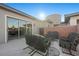 Patio with comfortable seating and sliding glass doors at 6833 Desert Crimson St, Las Vegas, NV 89148