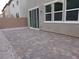 Private backyard with paved patio area at 7001 Sylmar Ave, Las Vegas, NV 89113