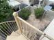 Private backyard with flagstone patio and spiral staircase access at 7555 Glowing Ember Ct # 201, Las Vegas, NV 89130