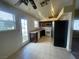 Kitchen with dark wood cabinets, granite countertops, and stainless steel appliances at 7555 Glowing Ember Ct # 201, Las Vegas, NV 89130