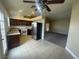 Open kitchen boasts stainless steel appliances and tiled floors at 7555 Glowing Ember Ct # 201, Las Vegas, NV 89130