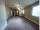 Large main bedroom with carpeted floors and ceiling fan at 7555 Glowing Ember Ct # 201, Las Vegas, NV 89130