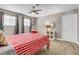 Red and white themed bedroom with a comfortable bed and closet at 821 Mar Jay Ct, Las Vegas, NV 89107