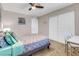 Bedroom with a queen bed, closet, and desk at 821 Mar Jay Ct, Las Vegas, NV 89107
