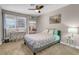 Cozy bedroom with a queen bed and a desk at 821 Mar Jay Ct, Las Vegas, NV 89107