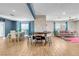 Bright dining area with a table and chairs, adjacent to a game room at 821 Mar Jay Ct, Las Vegas, NV 89107