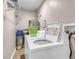 Laundry room with washer, dryer, and shelving at 821 Mar Jay Ct, Las Vegas, NV 89107