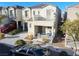 Two-story house with balcony, porch, and attached garage, aerial view at 9068 Alluring Ave, Las Vegas, NV 89149