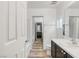 Bathroom with updated vanity and new flooring at 9068 Alluring Ave, Las Vegas, NV 89149