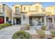 Two-story house with balcony, porch, and attached garage at 9068 Alluring Ave, Las Vegas, NV 89149