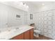 Clean bathroom with shower/tub combo and updated vanity at 10509 Ingelow Ct, Las Vegas, NV 89166