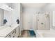 Double vanity bathroom with a large shower and soaking tub at 10509 Ingelow Ct, Las Vegas, NV 89166