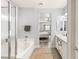 Elegant bathroom with soaking tub, double vanity, and walk-in shower at 10509 Ingelow Ct, Las Vegas, NV 89166
