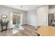 Bright dining area with sliding glass doors leading to backyard at 10509 Ingelow Ct, Las Vegas, NV 89166