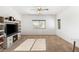 Bright and airy living room with large windows and neutral carpeting at 10509 Ingelow Ct, Las Vegas, NV 89166