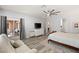 Main bedroom with a king-size bed, sitting area, and access to the backyard at 10509 Ingelow Ct, Las Vegas, NV 89166