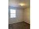 Neutral carpeted bedroom with a single window providing natural light at 12243 Pacific Cruise Ave, Las Vegas, NV 89138