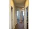 Neutral hallway showcases easy access to bedrooms and storage options at 12243 Pacific Cruise Ave, Las Vegas, NV 89138