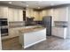 This kitchen features granite countertops, stainless steel appliances, and custom cabinets at 12243 Pacific Cruise Ave, Las Vegas, NV 89138