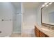 Bright bathroom featuring a shower, soaking tub, and vanity with granite countertop at 1701 King James St # 101, Las Vegas, NV 89144