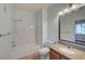 Clean bathroom with a shower-tub combo and granite countertop at 1701 King James St # 101, Las Vegas, NV 89144