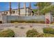 Elegant community signage featuring the name Carlisle, set amidst lush landscaping and stately architecture at 1701 King James St # 101, Las Vegas, NV 89144