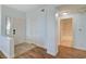 Inviting foyer leading to a full bath and front door at 1701 King James St # 101, Las Vegas, NV 89144