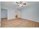Spacious main bedroom boasts wood floors and access to a bathroom and walk-in closet at 1701 King James St # 101, Las Vegas, NV 89144