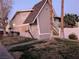 A-frame style building exterior with landscaping and walkway at 208 Orland St # 9, Las Vegas, NV 89107