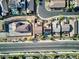 Aerial view showcasing a house with a private pool and surrounding homes at 25 Via Corvina, Henderson, NV 89011