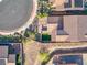 Aerial view of a house and surrounding landscape, showing backyard and neighborhood at 25 Via Corvina, Henderson, NV 89011