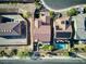 Aerial view showcasing a house with a private pool and surrounding homes at 25 Via Corvina, Henderson, NV 89011