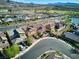 Aerial view of house and neighborhood with lake at 25 Via Corvina, Henderson, NV 89011