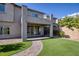 View of backyard with patio, artificial turf and landscaping at 25 Via Corvina, Henderson, NV 89011