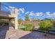 Landscaped backyard with artificial turf and patio at 25 Via Corvina, Henderson, NV 89011