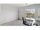 Bright bedroom with balcony access and a workspace at 25 Via Corvina, Henderson, NV 89011