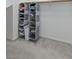 Well-organized closet with hanging shelves and storage at 25 Via Corvina, Henderson, NV 89011