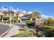 Two-story house with gray garage door and landscaping at 25 Via Corvina, Henderson, NV 89011