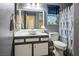 Bathroom with single vanity, updated fixtures, and a shower/tub at 2594 Florida Keys Dr, Las Vegas, NV 89156