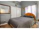 Bedroom with mirrored closet and neutral-toned bedding at 2594 Florida Keys Dr, Las Vegas, NV 89156