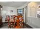 Dining room with hardwood floors, wood table and chairs, and view of exterior at 2594 Florida Keys Dr, Las Vegas, NV 89156