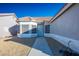 House exterior featuring a walkway to the front door and bay windows at 2594 Florida Keys Dr, Las Vegas, NV 89156