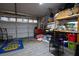 Garage with workbench, storage shelves, and American Flag at 2594 Florida Keys Dr, Las Vegas, NV 89156