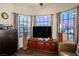 Bright Gathering room features a large TV, comfortable seating, and ample natural light at 2594 Florida Keys Dr, Las Vegas, NV 89156