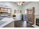 Kitchen with breakfast bar, sliding glass door to patio, and a view of the living room at 2594 Florida Keys Dr, Las Vegas, NV 89156