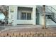 Building exterior with teal door and stairs at 3318 N Decatur Blvd # 1073, Las Vegas, NV 89130