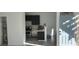 Modern kitchen with dark cabinets and stainless steel appliances at 3318 N Decatur Blvd # 1073, Las Vegas, NV 89130